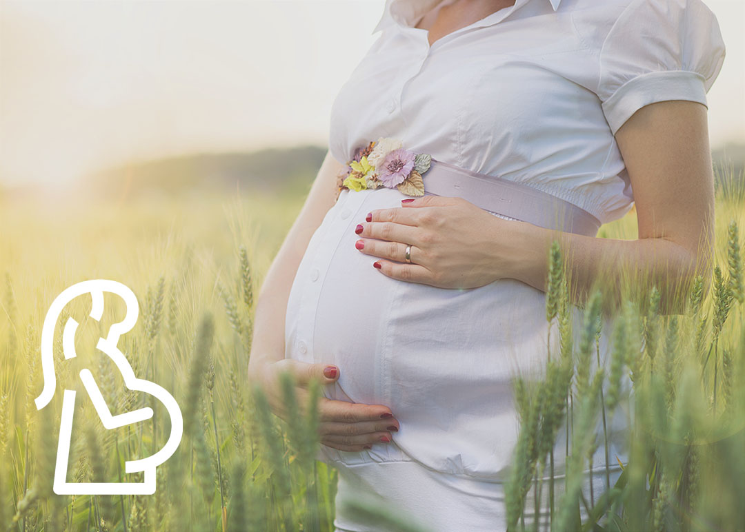 Pregnant woman in the field